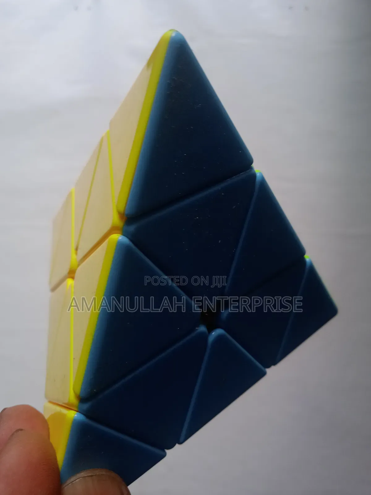 Pyramid Speed Cube, Also Known as a Pyraminx.