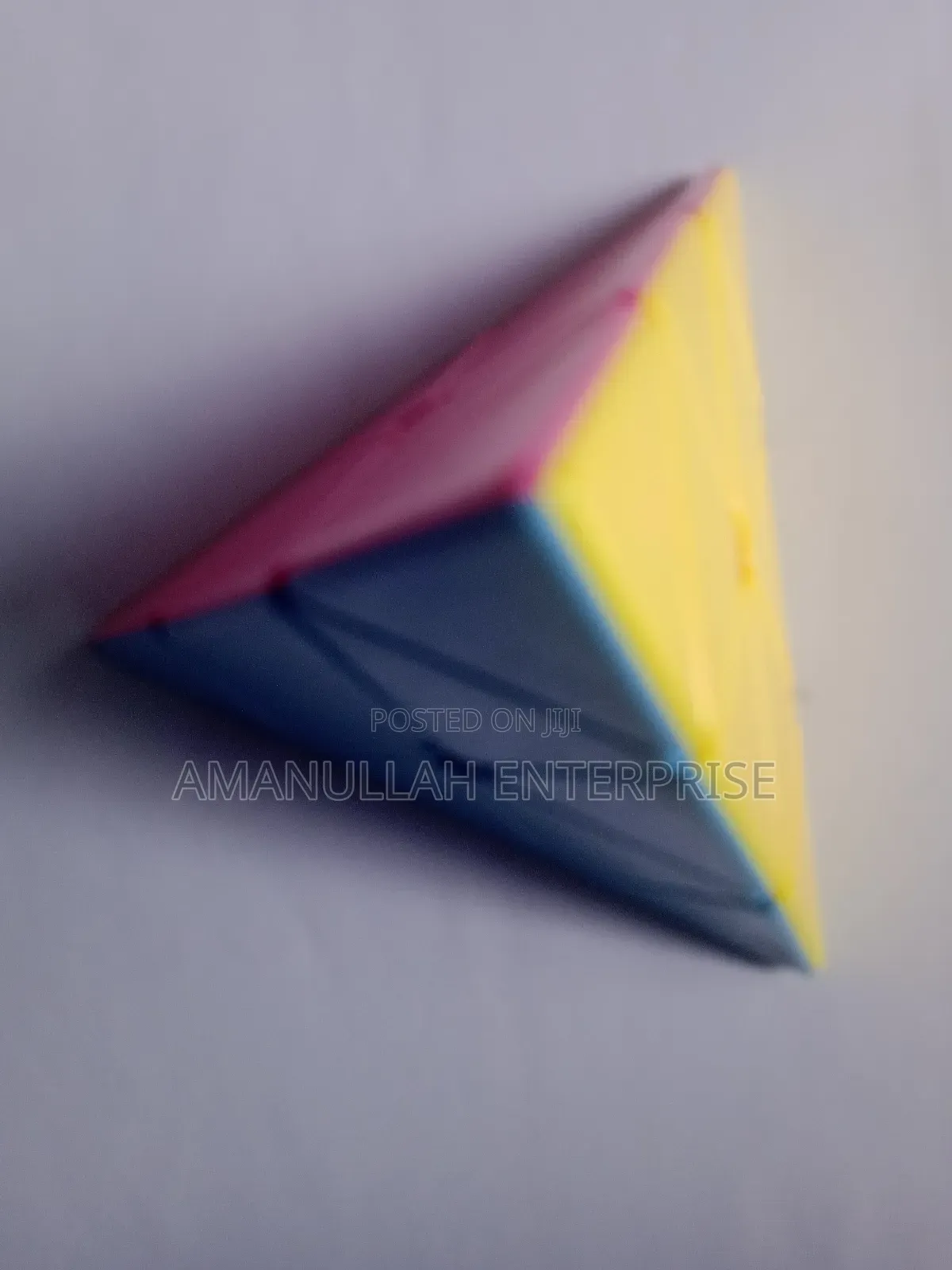 Pyramid Speed Cube, Also Known as a Pyraminx.