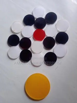 Carrom Guti Set With a Striker.