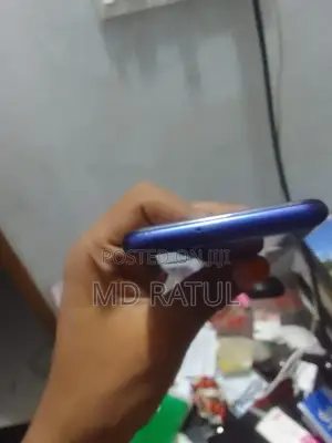 Photo - New Samsung Galaxy M21 64 GB Blue