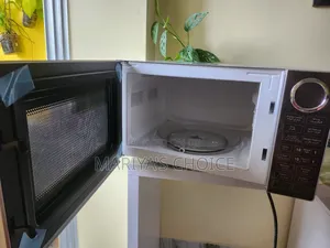 “Upgrade Your Kitchen With Style – Midea 25l Digital Microwave