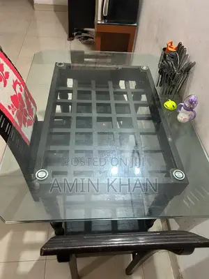 Photo - Shegun Wooden Dining Table With 4 Chairs