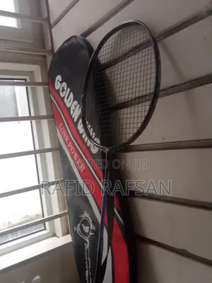 Photo - Racket- Golden Wing