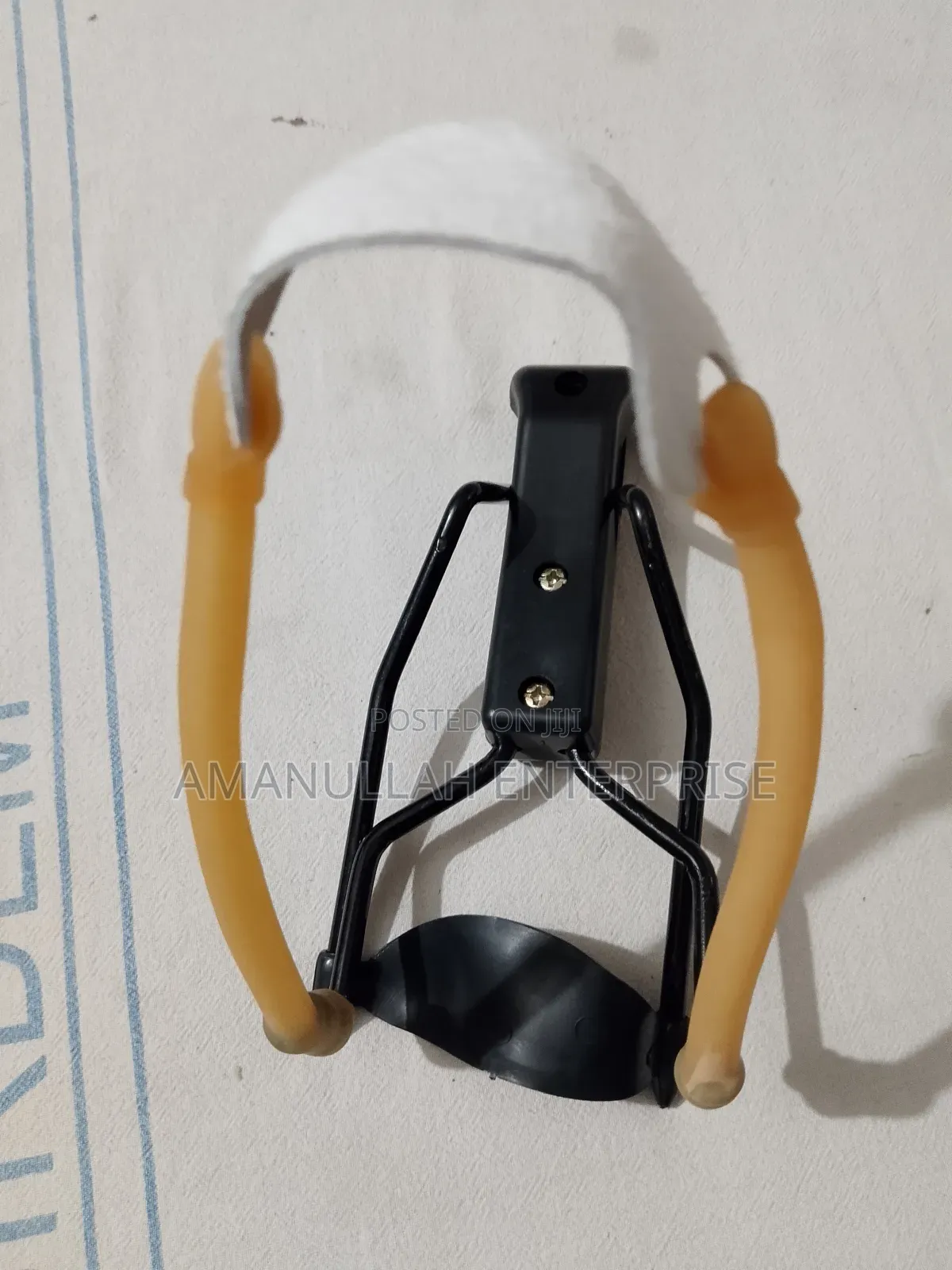 Slingshot / Small Hand-Powered Projectile Weapon.