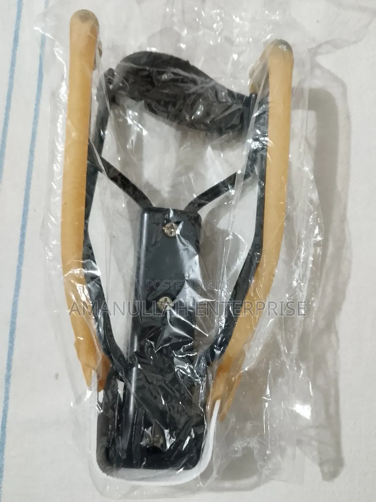 Slingshot / Small Hand-Powered Projectile Weapon.