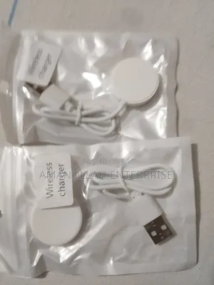 Photo - Wireless Charger, Likely Designed for a Smartwatch or Similar Small.