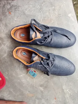 Photo - Lee Cooper এর জুতা