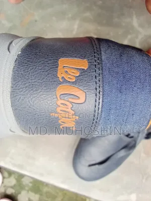 Lee Cooper এর জুতা