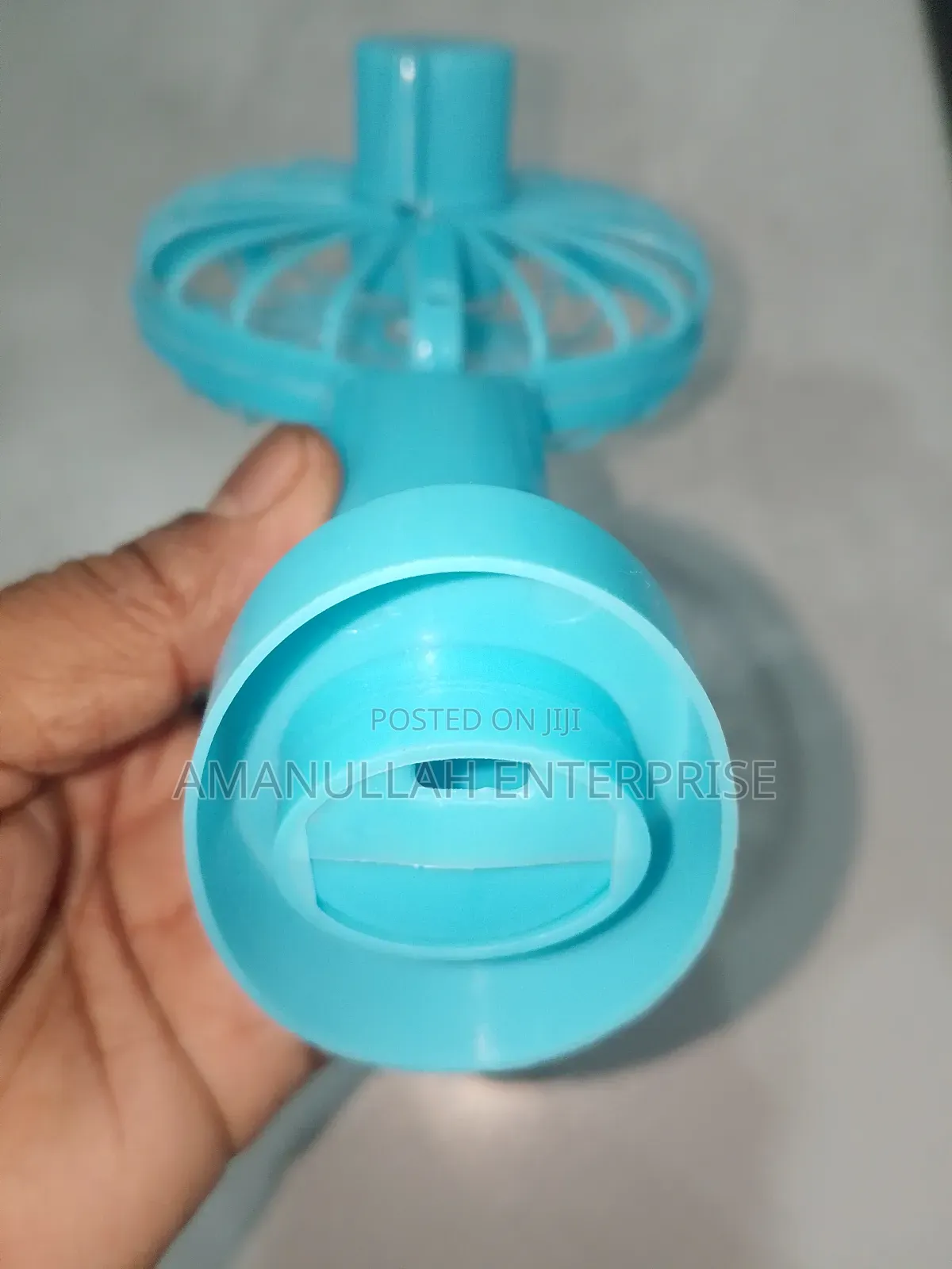 Disassembled Components of a Portable Rechargeable Mini Fan.