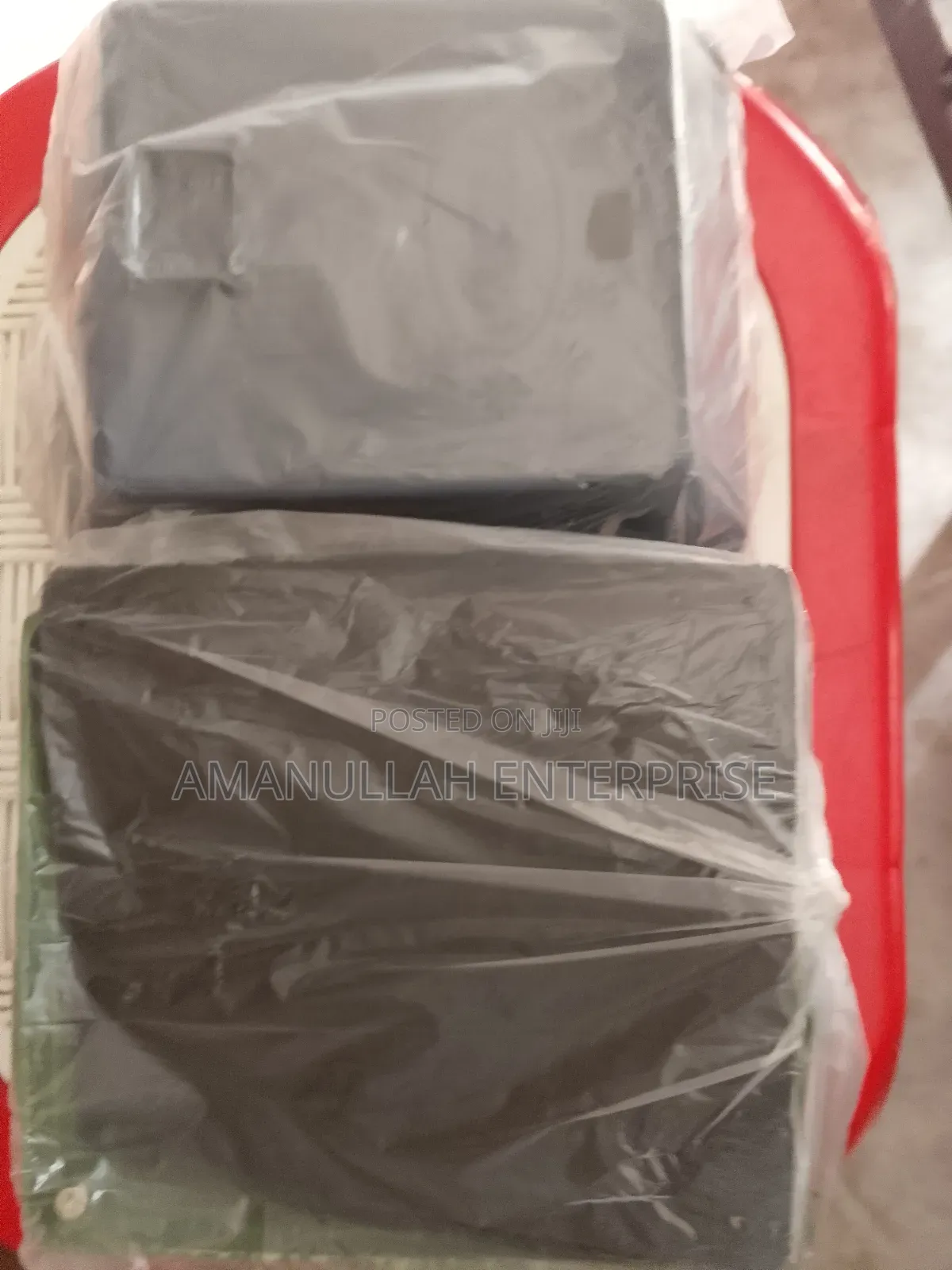 Disassembled Components of a Portable Mini Fan.