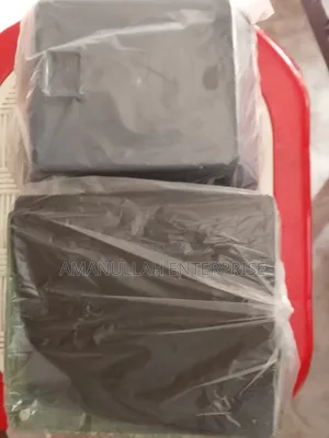 Disassembled Components of a Portable Mini Fan.