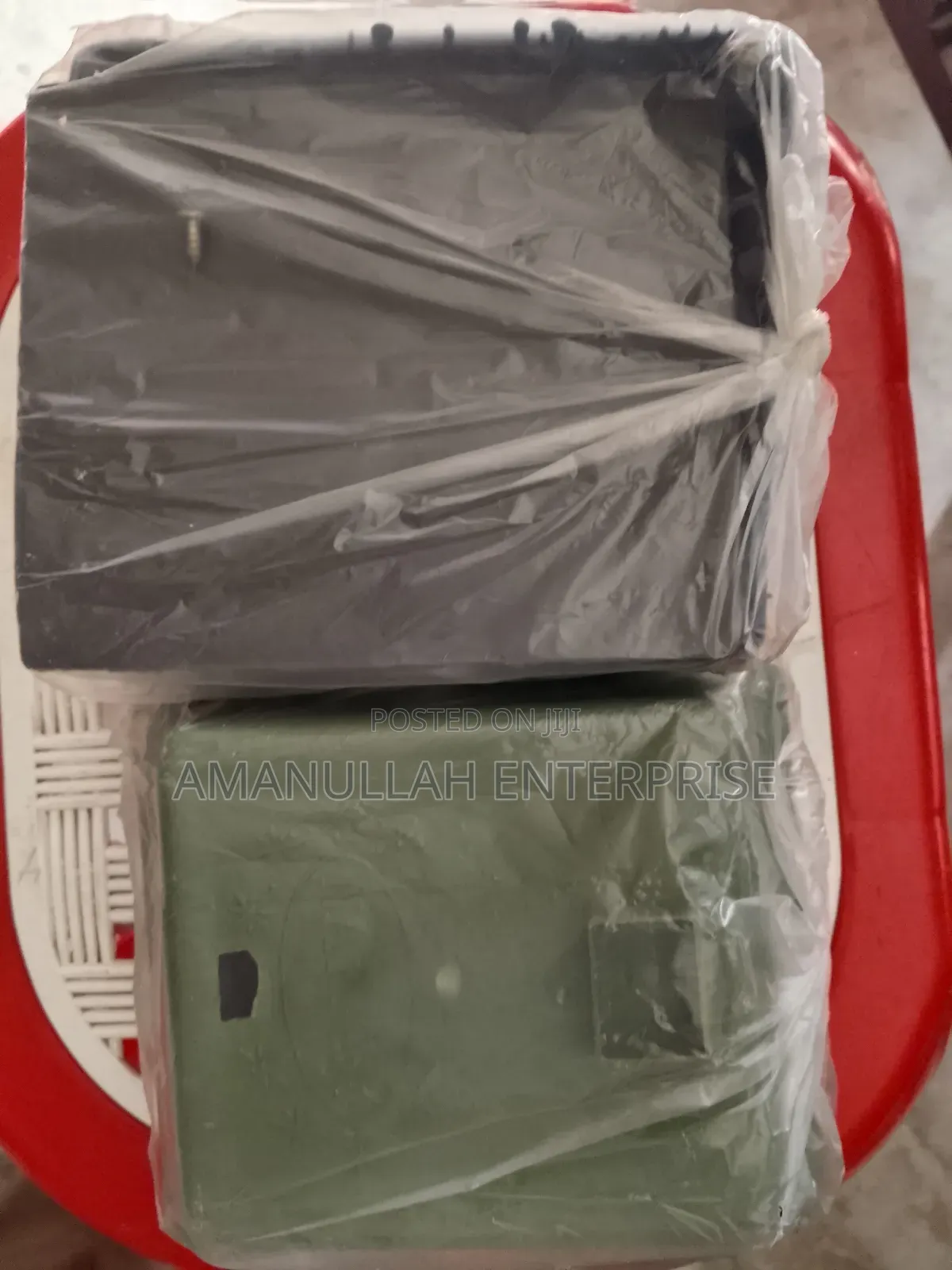 Disassembled Components of a Portable Mini Fan.