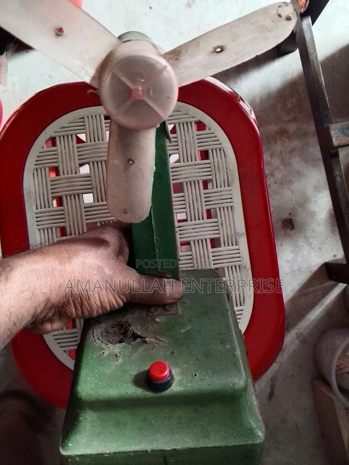 Disassembled Components of a Portable Mini Fan.