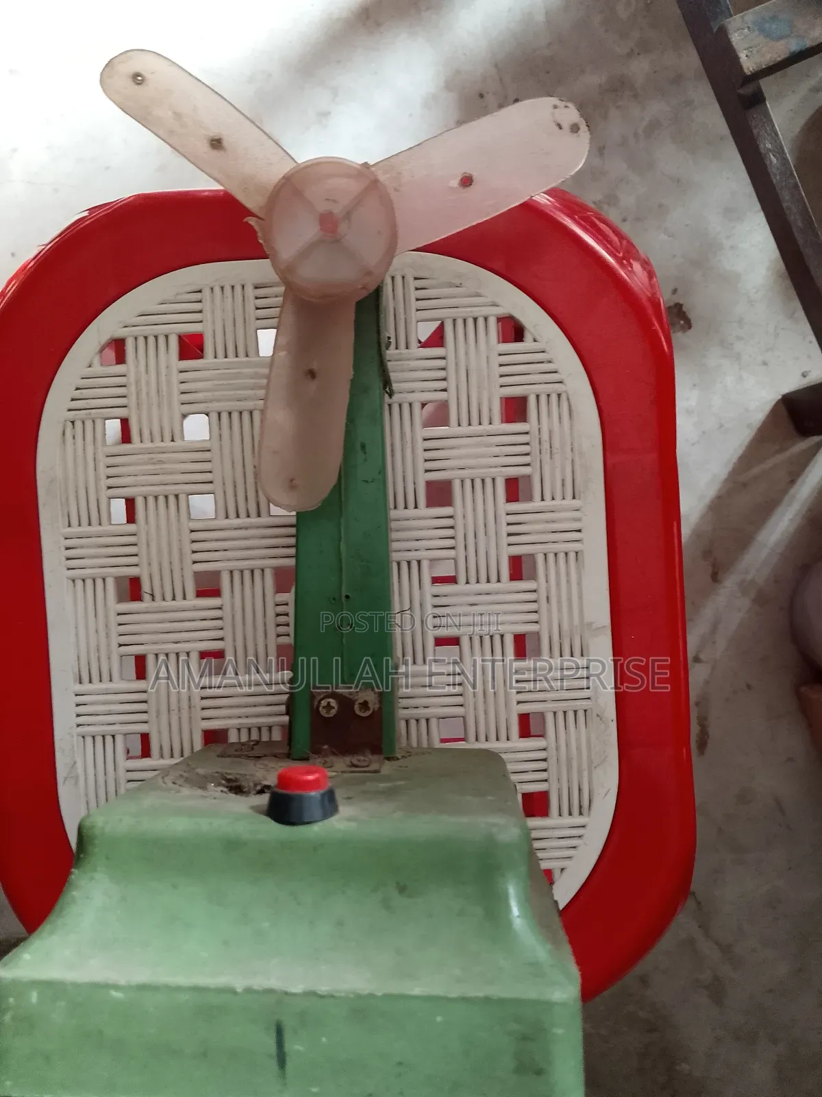 Disassembled Components of a Portable Mini Fan.