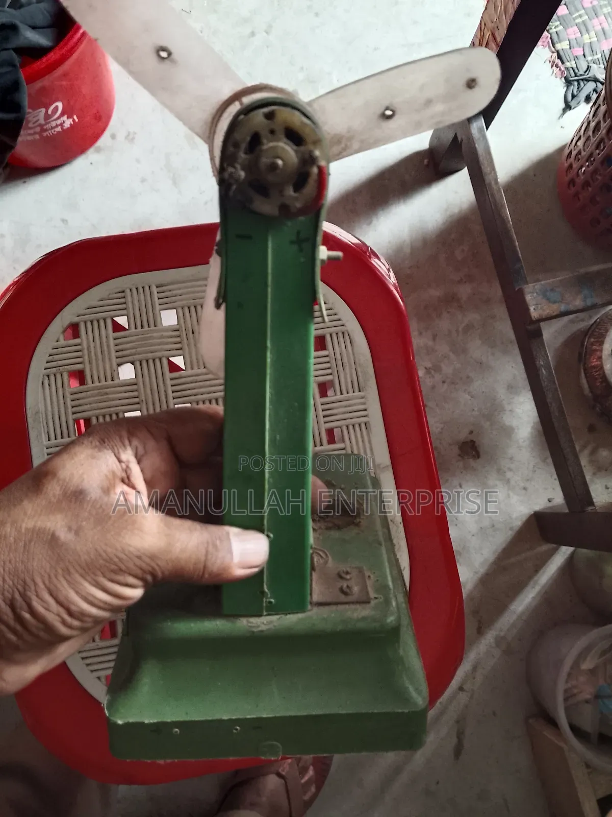 Disassembled Components of a Portable Mini Fan.