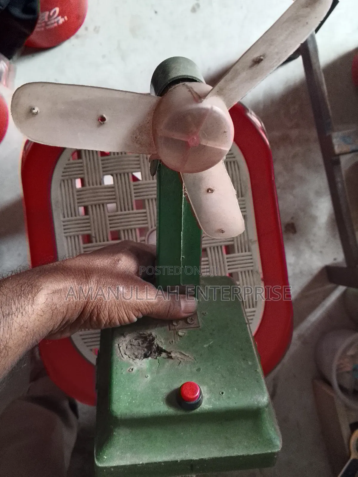 Disassembled Components of a Portable Mini Fan.