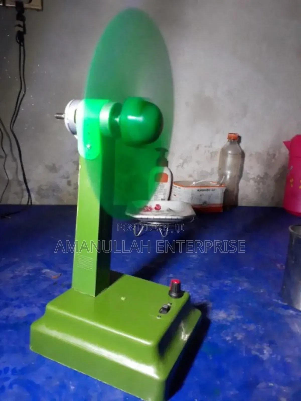 Disassembled Components of a Portable Mini Fan.