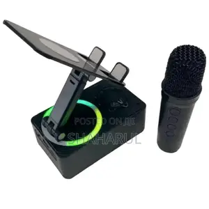 Photo -  Rotating Foldable Cell Phone Stand With Bluetooth Speaker