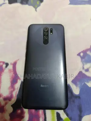 Photo - Xiaomi Redmi 9 64 GB Red