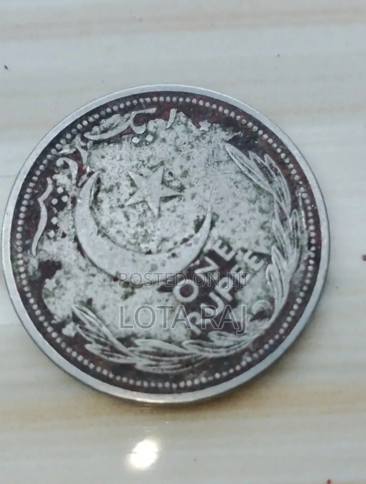 ১৯৪২ সালের পাকিস্তানি আমলের অনেক পুরাতন কয়েন এক পয়সা।1 Rupees