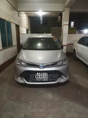Photo - Toyota Corolla Fielder 1.5 Hybrid FWD 2017 Silver