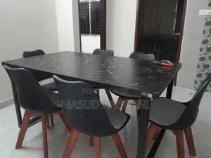 Photo - Dinning Table With Tulip  Chair Black Color