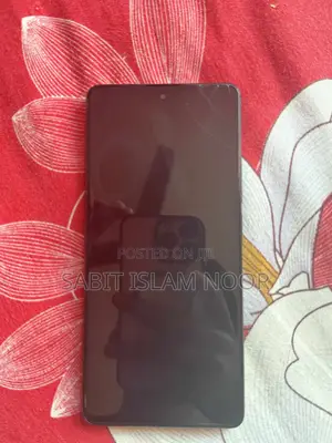 Photo - Xiaomi Redmi Note 13 256 GB Red