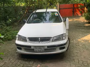Photo - Nissan Sunny B15 Sedan 1.3 2001 White