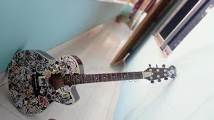 Photo - Guiter Sell