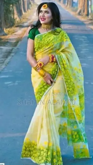 হ্যান্ড প্রিন্ট হাফ সিল্ক শাড়ি