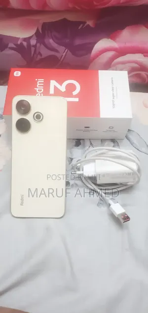 Photo - New Xiaomi Redmi 13 128 GB Gold