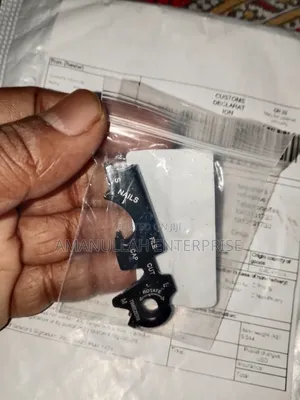 Stainless Steel Multitool Keychain Portable Tool for Various Tasks.