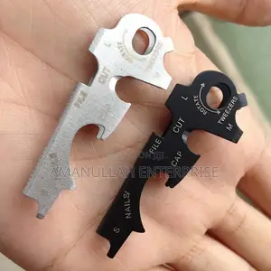 Photo - Stainless Steel Multitool Keychain Portable Tool for Various Tasks.