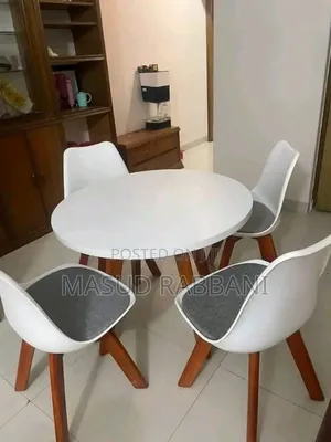 Photo - Dinning Table With Tulip  Chair White