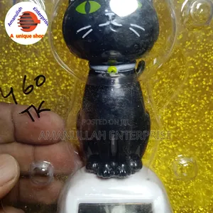 Solar-Powered Dancing Cat Bobblehead Toy.