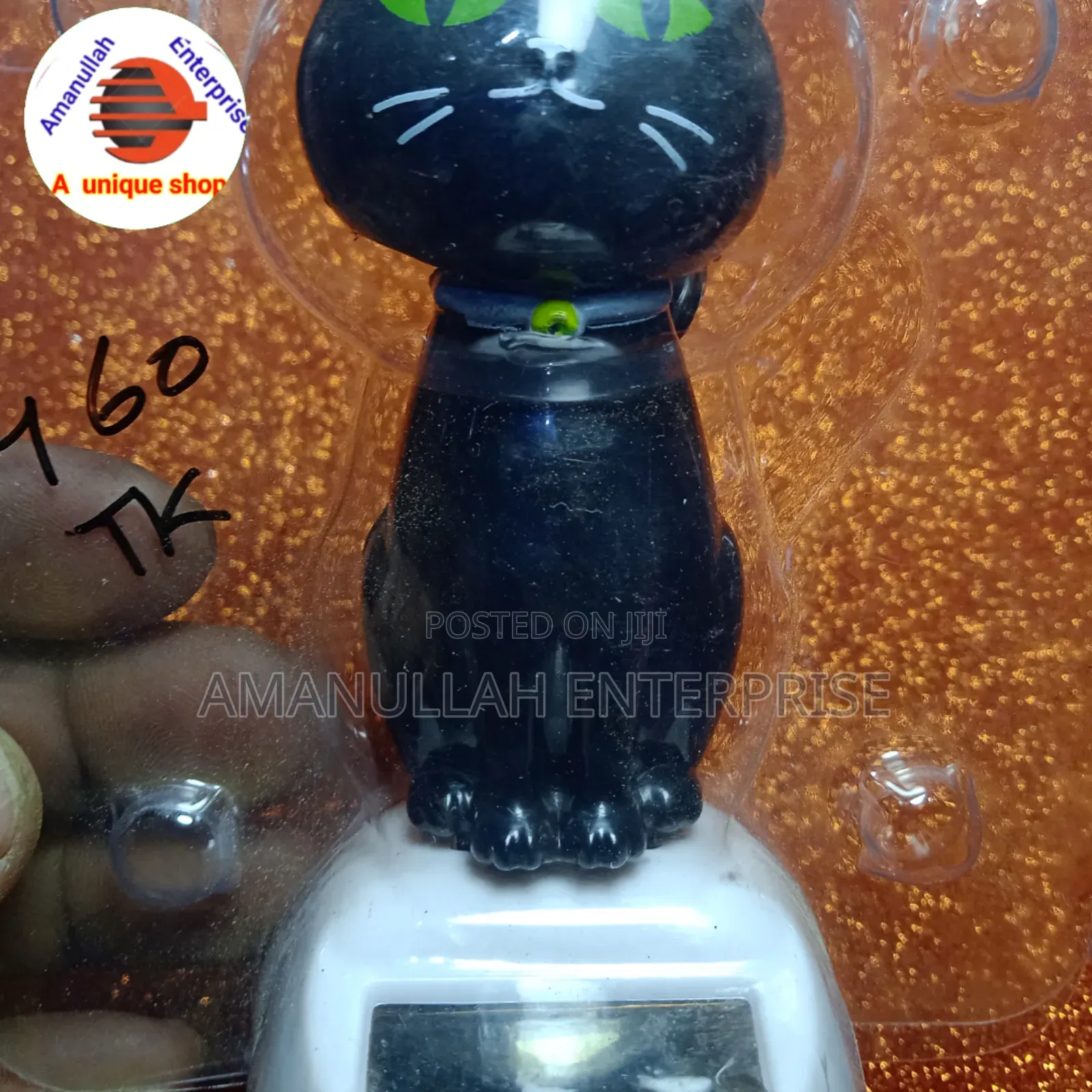 Solar-Powered Dancing Cat Bobblehead Toy.