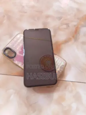 Photo - Apple iPhone X 64 GB Gold