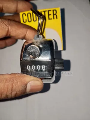 Photo - Hongxin Hand Tally Counter. It Is a Mechanical Counting Device.