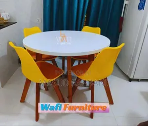 Photo - Dinning Table With Tulip Chair Yellow