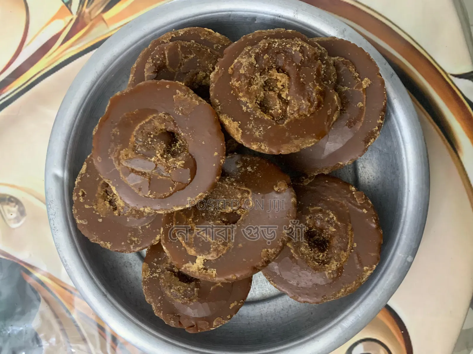 নওগাঁর বিখ্যাত খেজুরের বাটালি গুড়