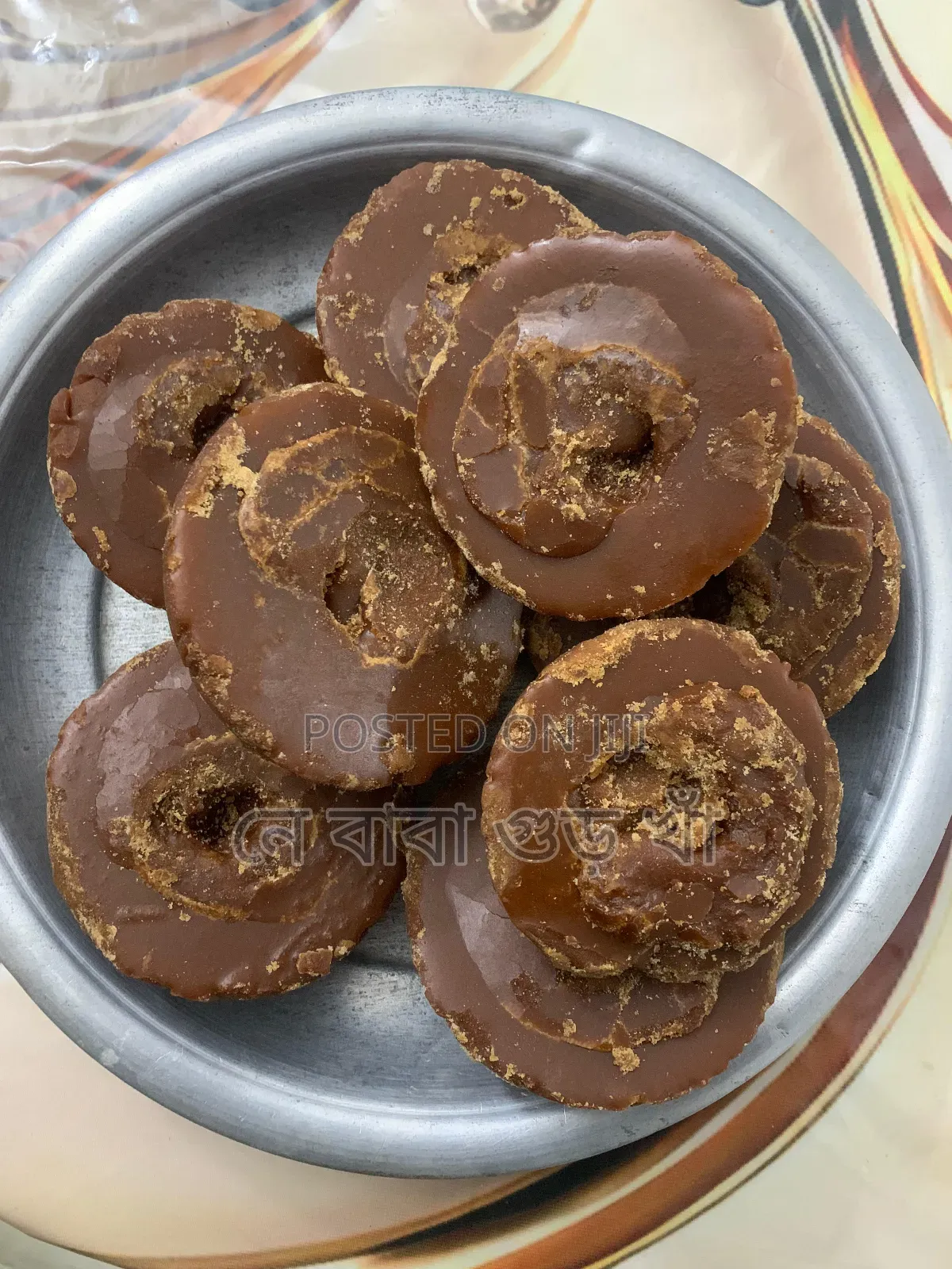 নওগাঁর বিখ্যাত খেজুরের বাটালি গুড়