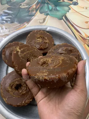 নওগাঁর বিখ্যাত খেজুরের বাটালি গুড়