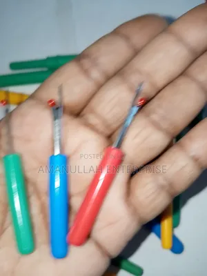 Photo - Seam Rippers, a Essential Sewing Tools Used for Removing Stitches.