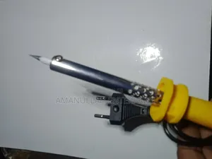 Photo - Soldering Iron 60w a Hand Tool That Supplies Heat to Melt Solder.