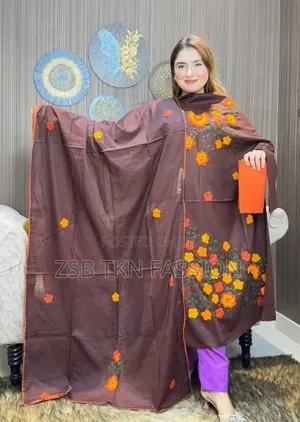 Photo - এ্যাপ্লিক কাজ করা থ্রি পিস ড্রেস New Update