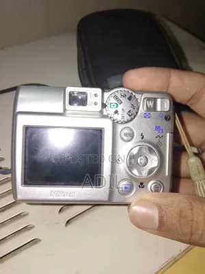 Camera With Battery Charger
