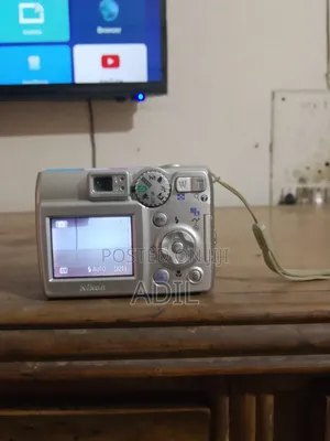 Camera With Battery Charger