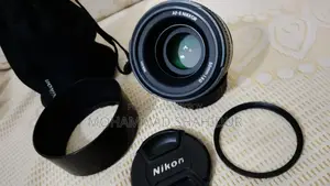 Nikon 50mm 1.8G প্রাইম লেন্স সাথে ক্যাপ, হুড, ইউভি ফিল্টার এবং পাউচ