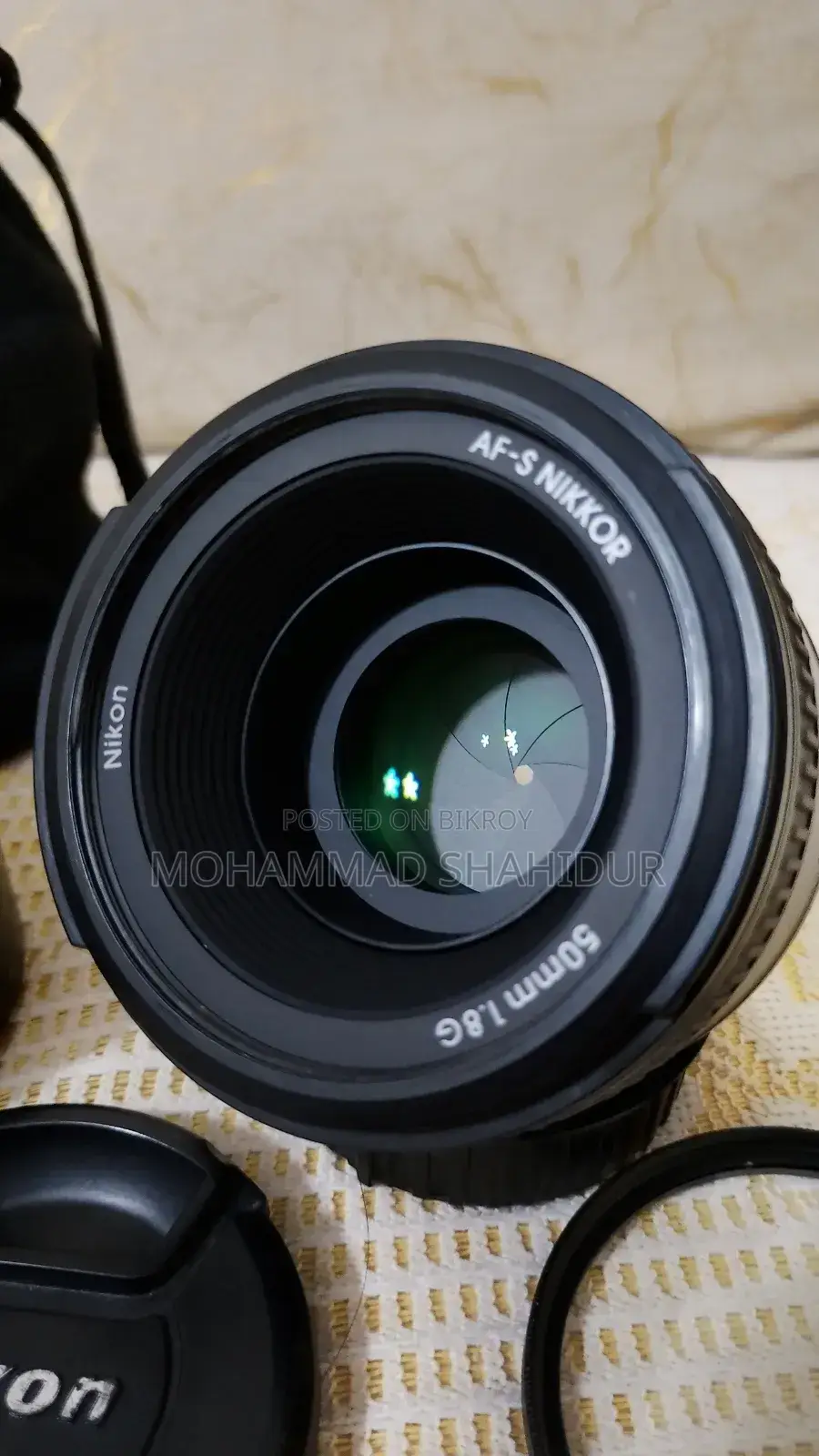 Nikon 50mm 1.8G প্রাইম লেন্স সাথে ক্যাপ, হুড, ইউভি ফিল্টার এবং পাউচ