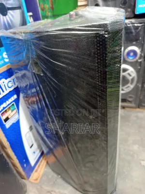 Model: B12d, 12" Chinese Speaker Box Attached to an Amplifier.